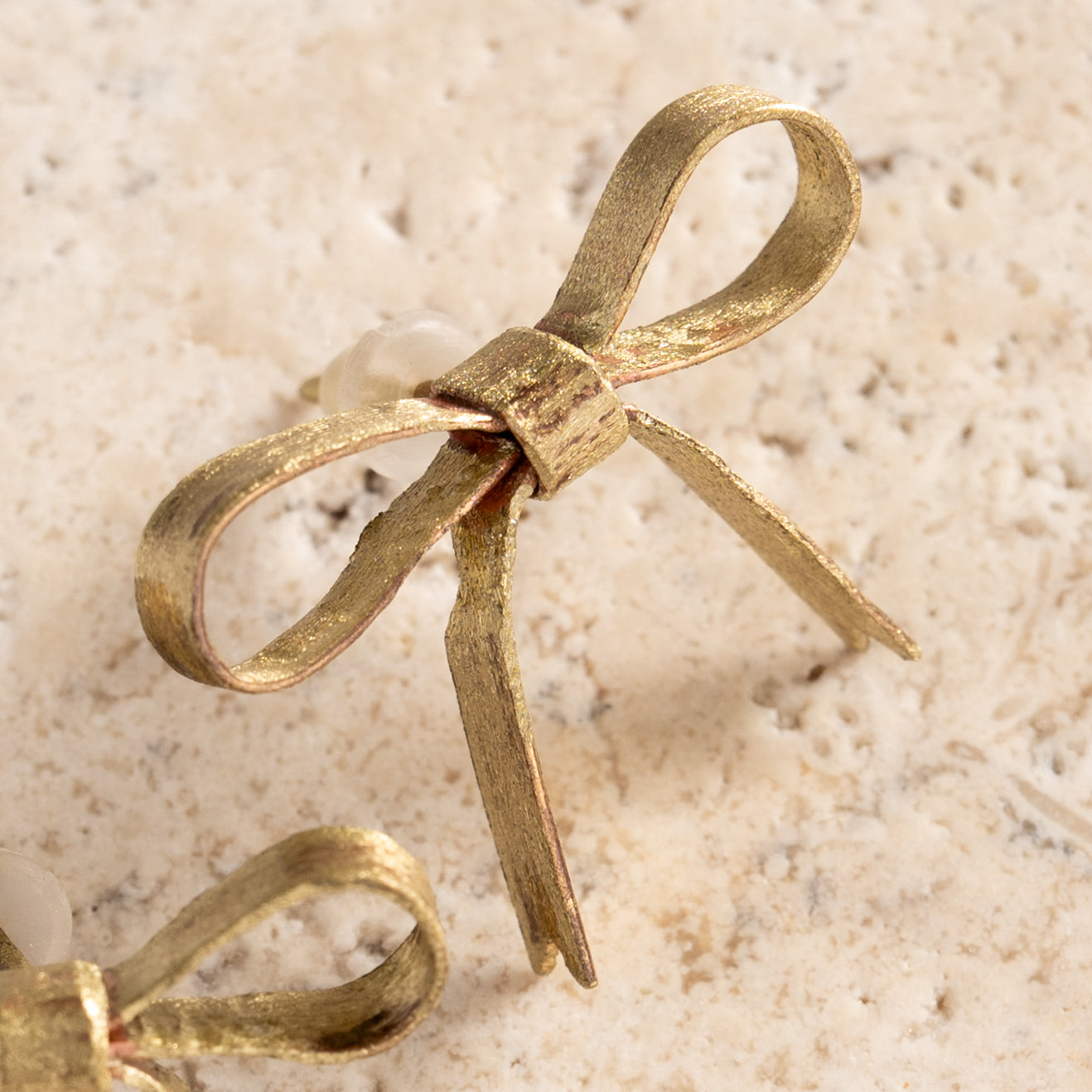 Dorada Bronze Bow Earrings - Ten Thousand Villages