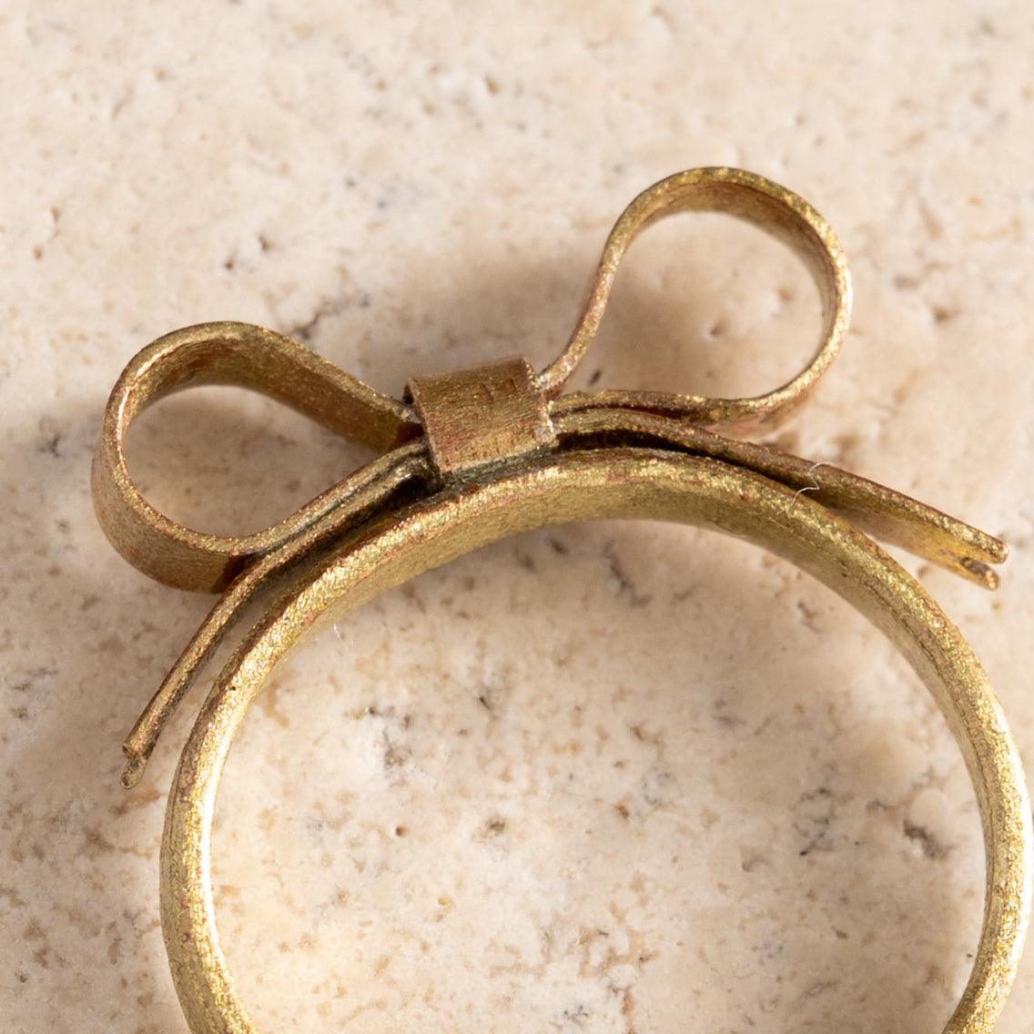 Dorada Bronze Bow Ring - Ten Thousand Villages