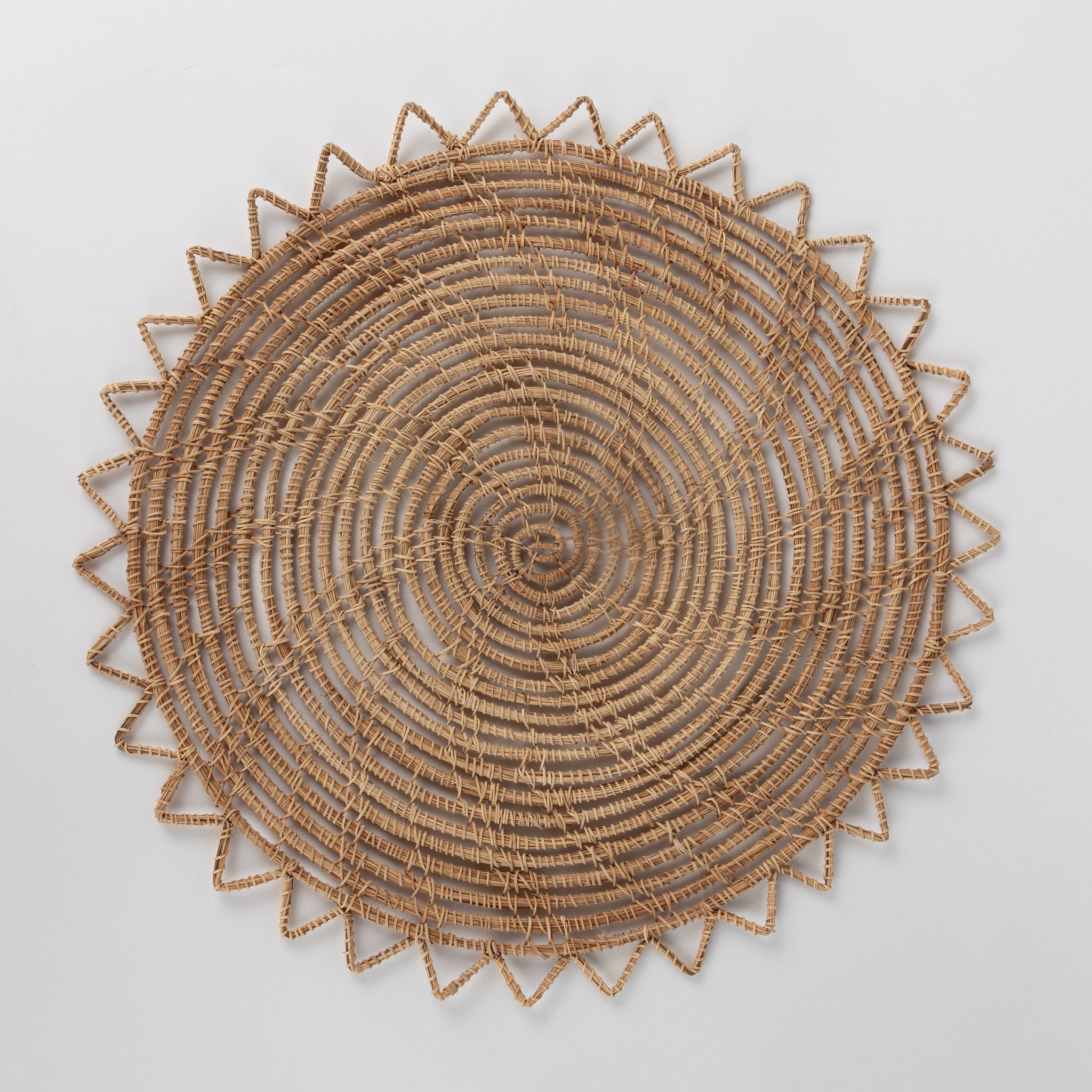 Sarpila Round Handwoven Palm Placemat - Ten Thousand Villages