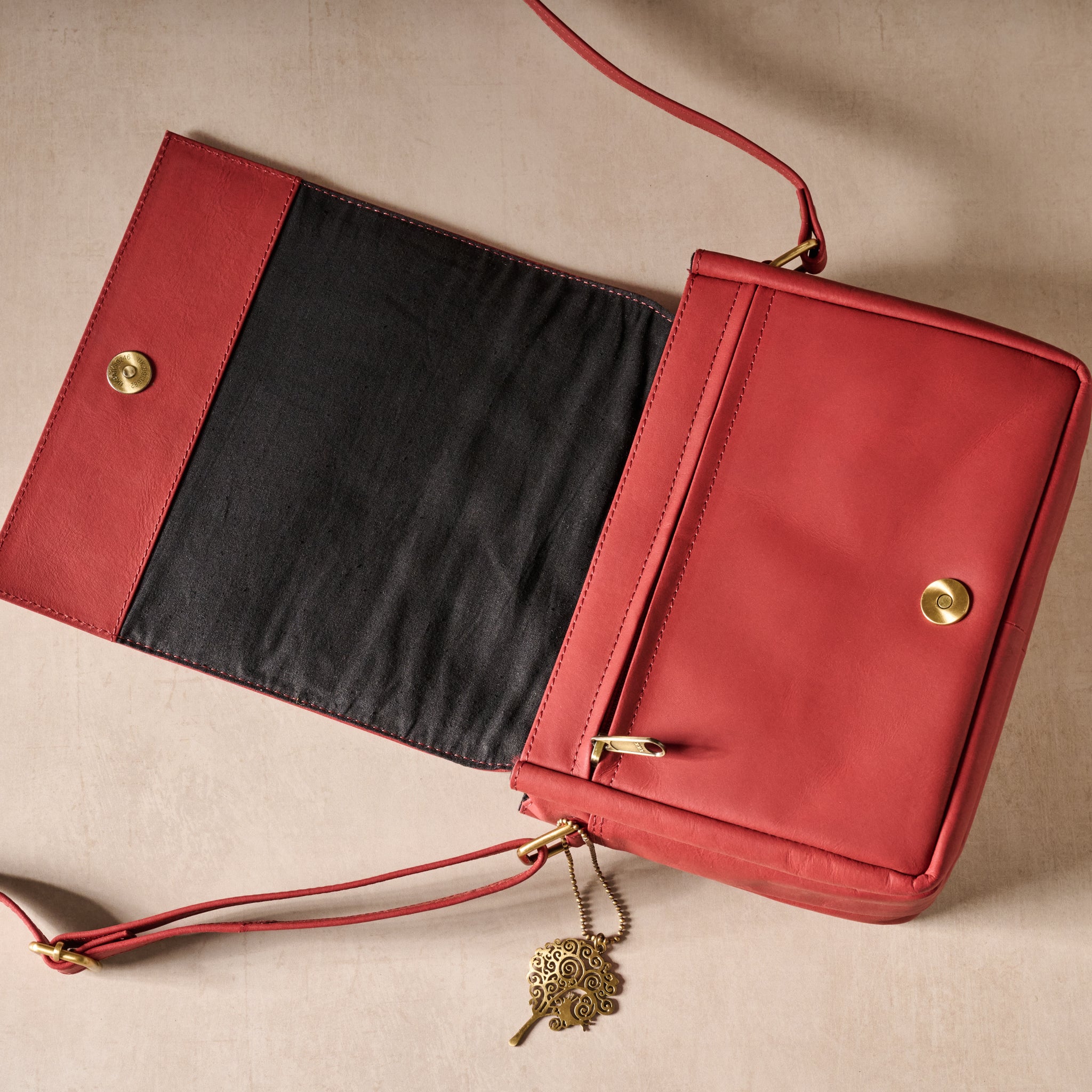 Kohra Embossed Leather Crossbody Bag - Ten Thousand Villages