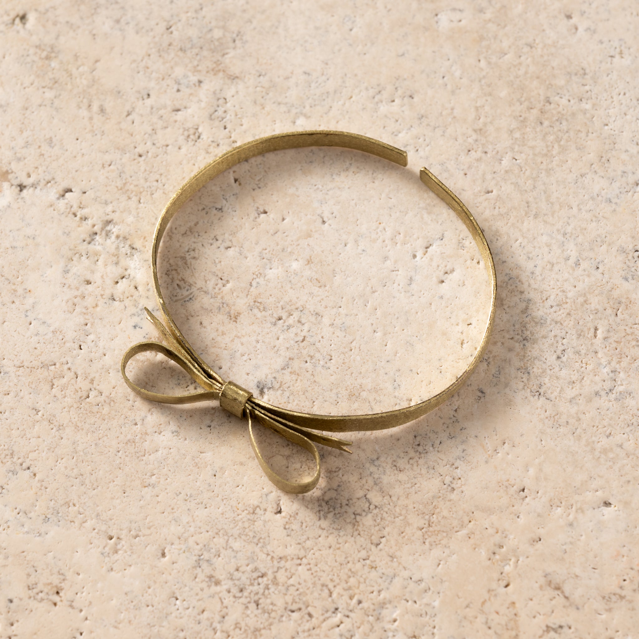 Dorada Bronze Bow Bracelet - Ten Thousand Villages