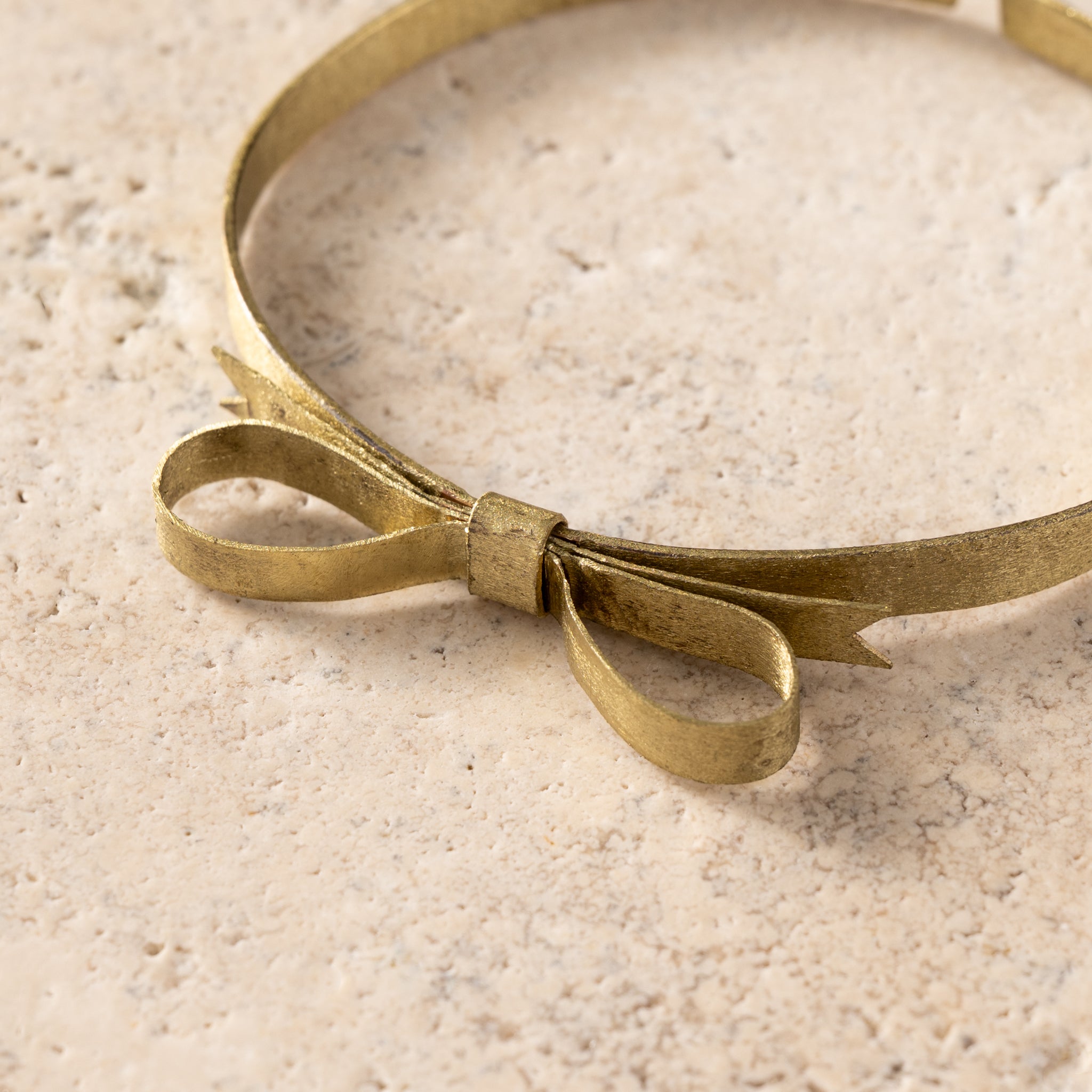 Dorada Bronze Bow Bracelet - Ten Thousand Villages
